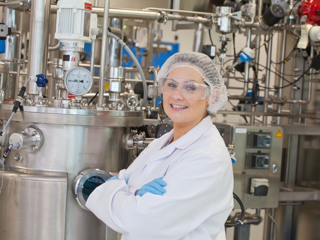 Scientist in a life sciences cleanroom production facility