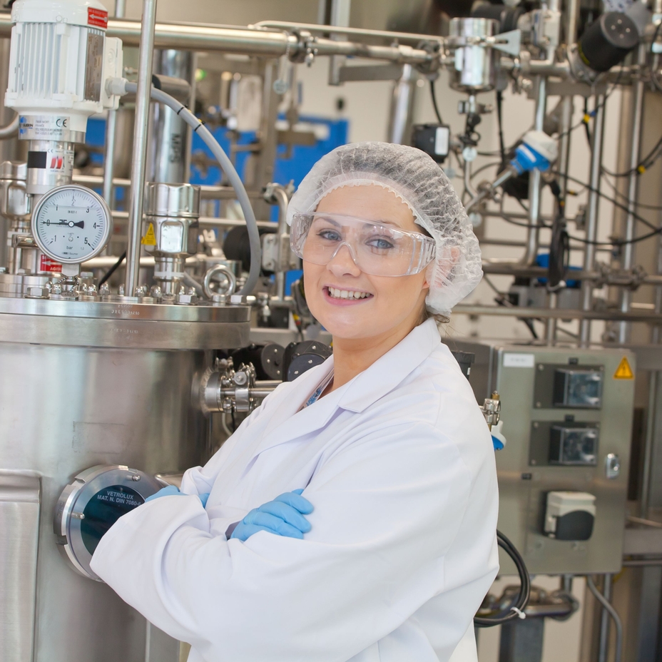 Scientist in a life sciences cleanroom production facility